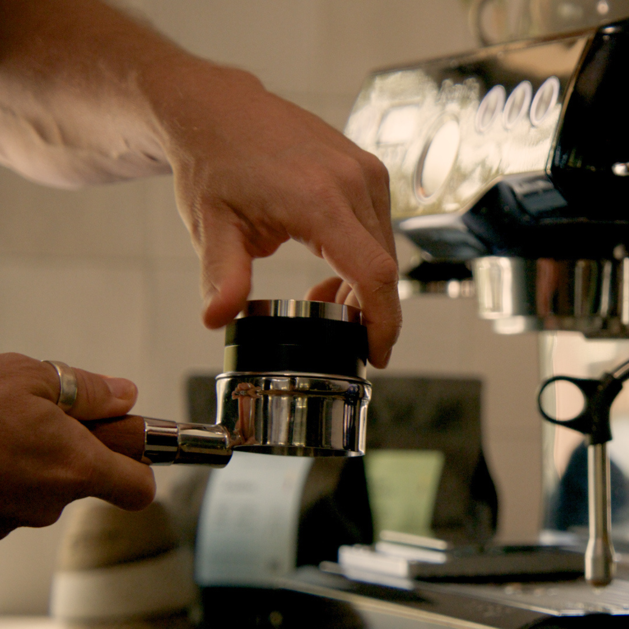 Adjustable 2-in-1 58mm Tamper & Distributor – Barista Grade — lifestyle shot